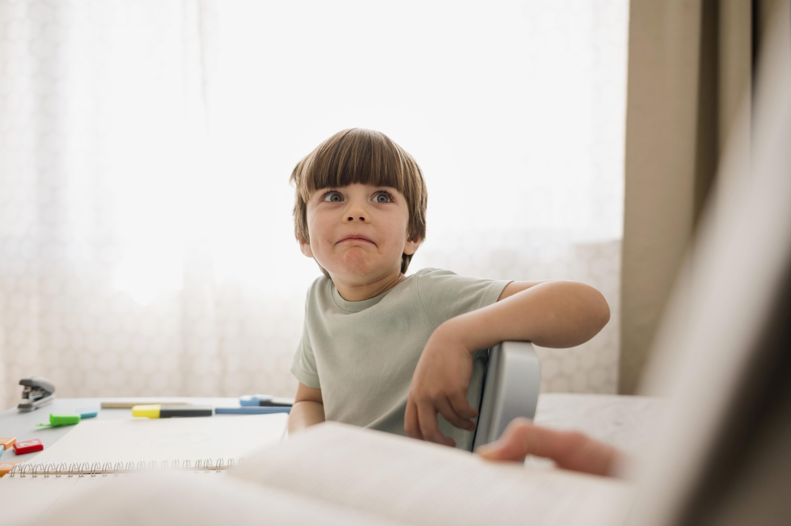 front-view-child-being-tutored-home
