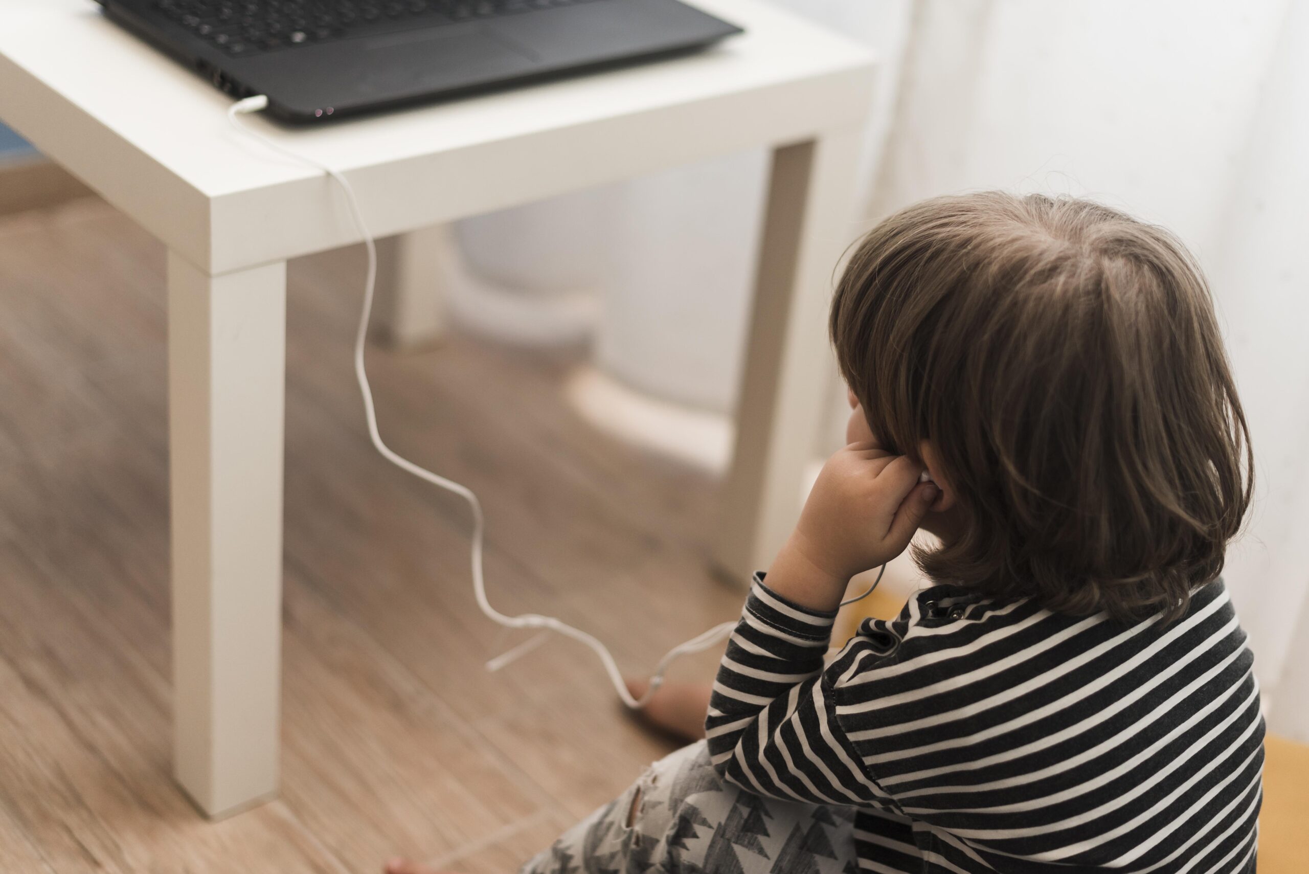 high-angle-kid-using-headphones
